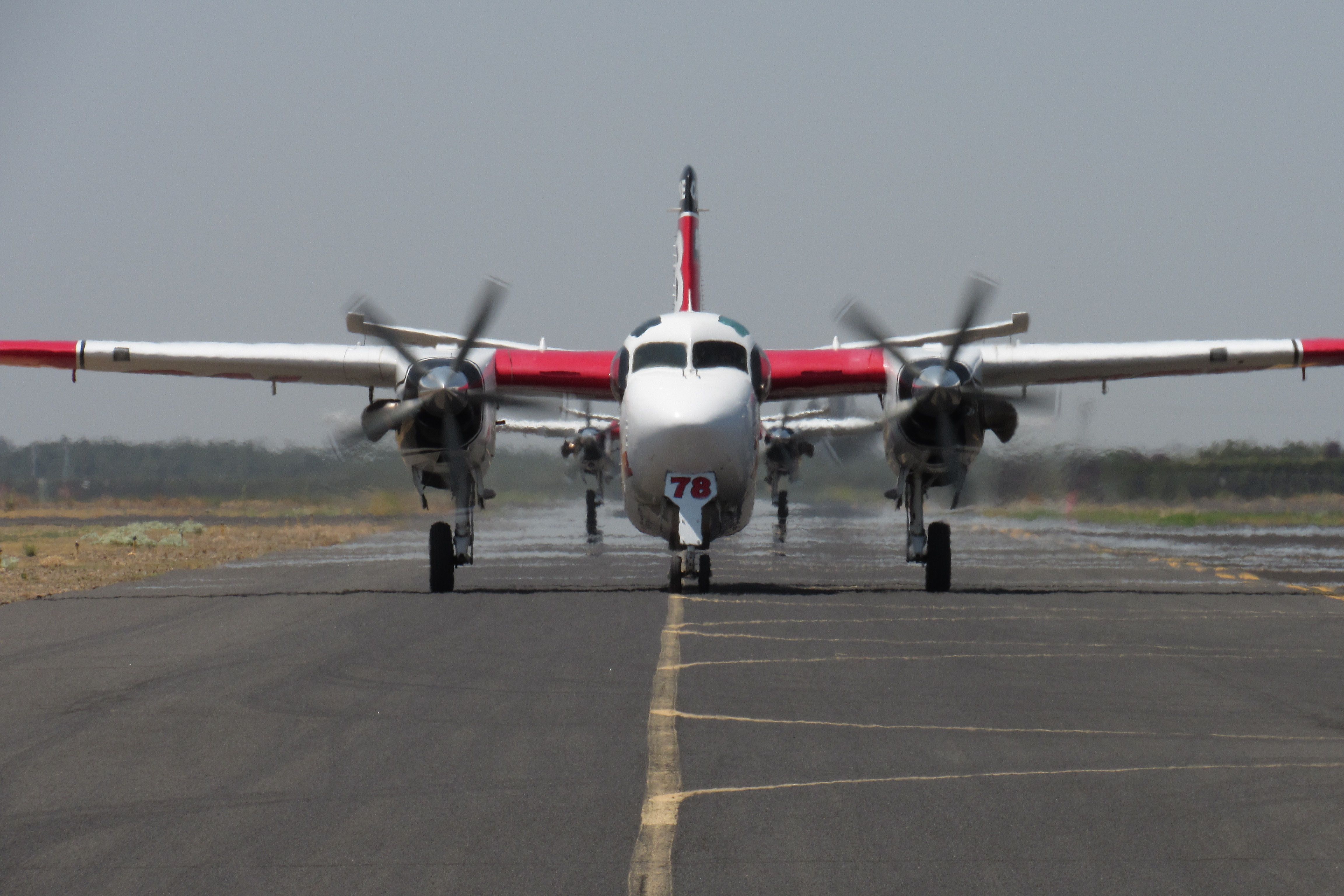 MARSH Turbo Tracker (N431DF) - Tanker 78 taxiing back to the base with Tanker 76 following. 