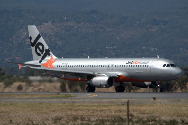 Airbus A320 (VH-VQV) - Braking hard after landing on runway 23. Thursday, 4th April 2013.