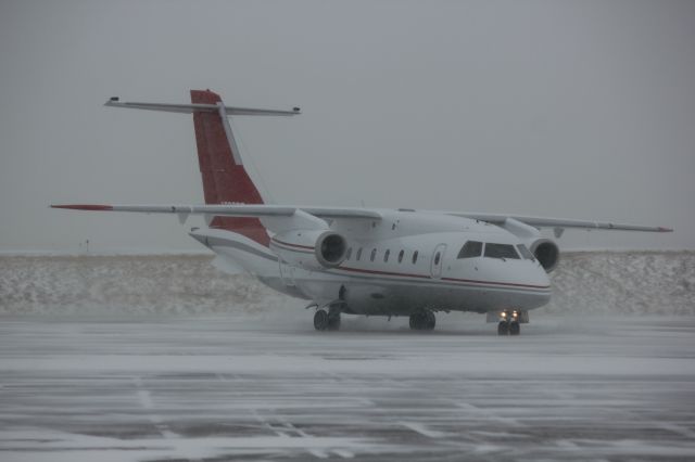 Fairchild Dornier 328JET (N398DC) - Landing safely in a ground blizzard at DIA in near white out conditions.