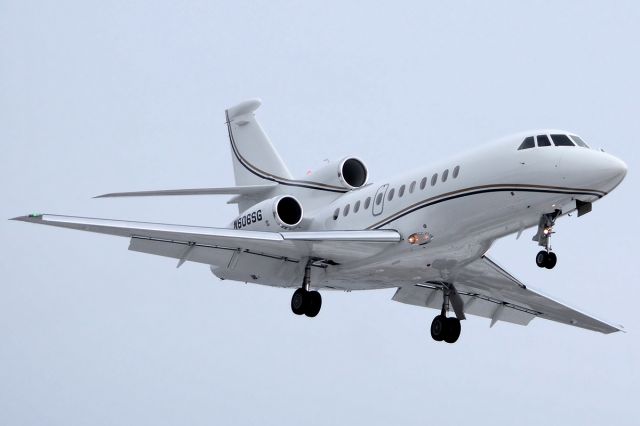 Dassault Falcon 900 (N606SG) - A Stephens Group 900EX returns home to a snow covered airport. 