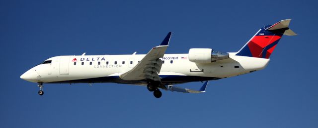 Canadair Regional Jet CRJ-200 (N659BR) - Arrival from KSLC, Rwy 30L, 07-08-2012