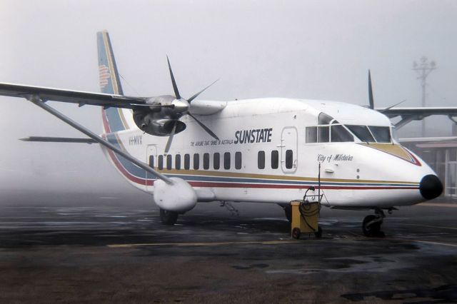 Beechcraft Super King Air 200 (VH-MVX) - SUNSTATE AIRLINES - SHORT 360 - REG : VH-MVX (CN SH3620) - MILDURA VIC. AUSTRALIA - YMIA 25/6/1988 GOT UP NICE AND EARLY IN THE FOG TO TAKE THIS ONE.35 MM SLIDE CONVERSION USING A LIGHTBOX AND A NIKON L810 DIGITAL CAMERA IN THE MACRO MODE. 