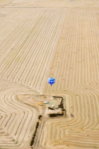 Unknown/Generic Balloon (C-FTTE) - Hot air balloon C-FTTE over farmland from hot air balloon C-GHER. October 2010