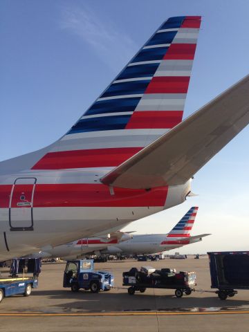 Boeing 737-800 — - B738 at KDFW. Boeing 777-300 (N719AN) in the background