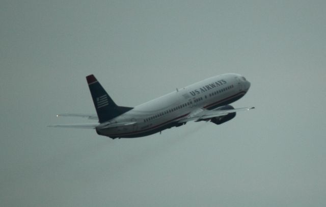 BOEING 737-400 (N450UW) - Just after take-off from RSW on 02/11/2001