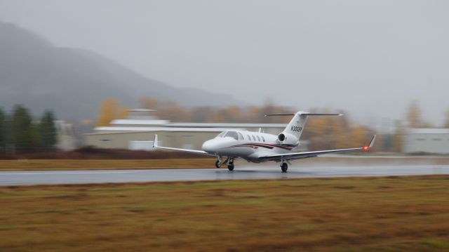 Cessna Citation CJ1 (N300BV) - A Cessna 525 equipped with Tamarack Aerospace Groups Active Winglets departs Sandpoint Airport on a rainy day.