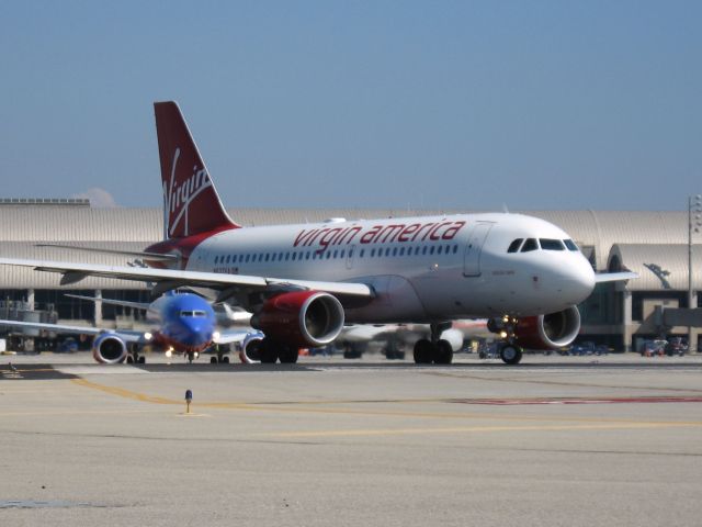 Airbus A319 (N527VA) - Turning onto RWY 19R