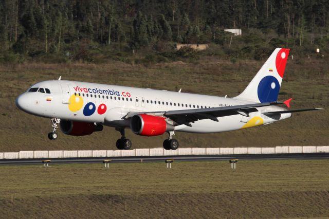 Airbus A320 (HK5051) - Touching down at Quito.