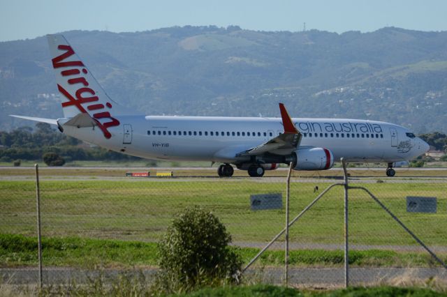 Boeing 737-800 (VH-YIB) - On taxiway heading for take-off on runway 05. Wednesday, 21st May 2014.