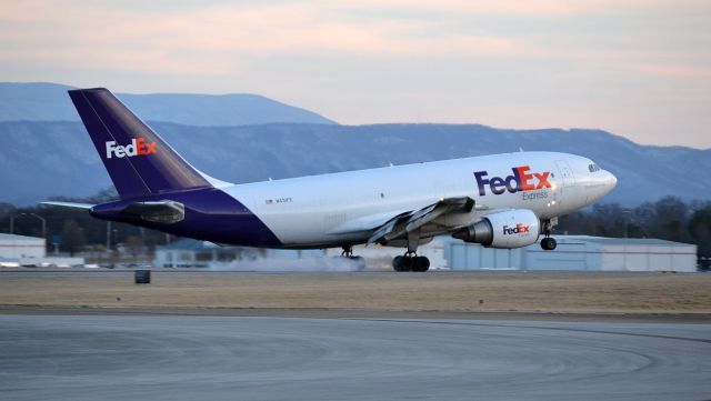 Airbus A310 (N431FE) - FedEx A310 "Asumi" touching down at McGhee Tyson in Alcoa, TN (TYS)