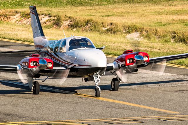 Beechcraft Baron (58) (N517RB) - Holding short at Alpha