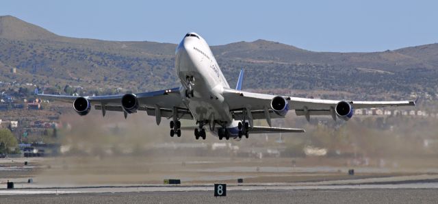 Boeing 747-400 (N194UA) - Flashback 2013 ~~br /This "Flashback" photo, taken 7 years ago (Apr 2013) with my old Canon T3i, captured United's N194UA, a B744, as it lifted away from RNO's shorter parallel Runway 16L on an AM departure with a full passenger load of United States Marines and all their equipment. The UA charter was transporting the Marines back to Cherry Point, N. Carolina.