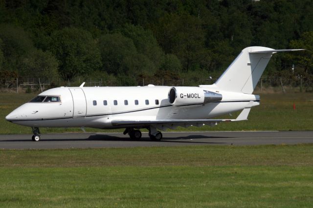 Canadair Challenger (G-MOCL) - London Executive Aviation Challenger 604 backtracking to depart rwy 06 on 15-May-19 heading for EGNV as LNX49CL.