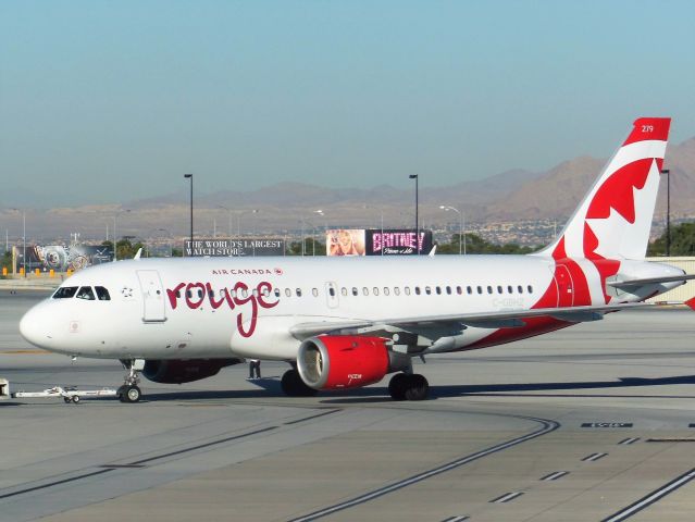 Airbus A319 (C-GBHZ) - Air Canada Rouge (RV) C-GBHZ A319-114 [cn813]br /Las Vegas (LAS). Air Canada Rouge flight RV1897 departing for Calgary (YYC). br /Taken from the Terminalbr /2014 11 10  a rel=nofollow href=http://alphayankee.smugmug.com/Airlines-and-Airliners-Portfolio/Airlines/AmericasAirlines/Air-Canada-Rouge-RV/i-WZvjVcthttps://alphayankee.smugmug.com/Airlines-and-Airliners-Portfolio/Airlines/AmericasAirlines/Air-Canada-Rouge-RV/i-WZvjVct/a