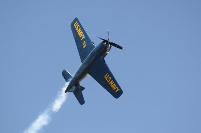 Cessna Citation CJ1 (N68RW) - F8F Bearcat performs during the 2012 Florida International Airshow