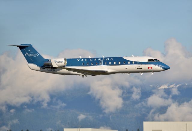 Canadair Regional Jet CRJ-100 (C-GFIO) - Vancouver International (CYVR/YVR) Specially equipped plane for checking and calibrating navigational equipment flying 500 feet above the runway.