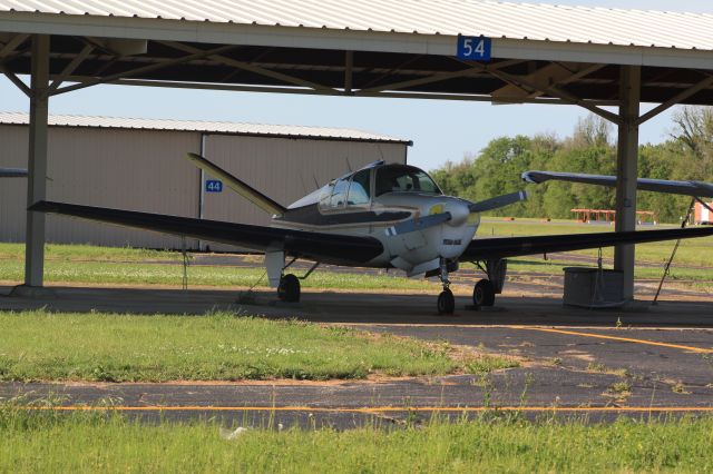 Beechcraft Bonanza (36) (N744B) - I saw this aircraft parked at KDTN, while waiting for one of our flights to come in.  I really like its paint scheme.