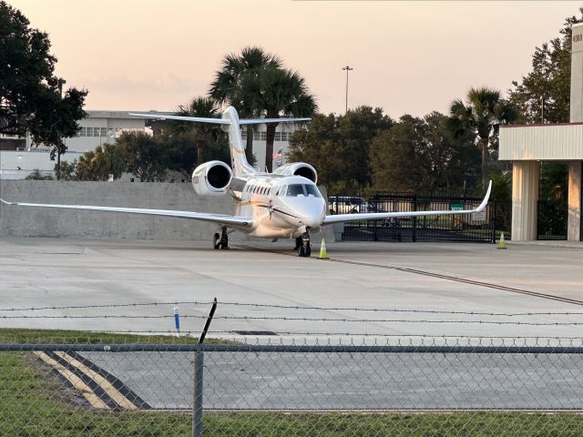 Cessna Citation X (N750JR) - Gorgeous 750 parked in front of an FBO easily visible from the street.  Early morning shot with iPhone 14Pro Max