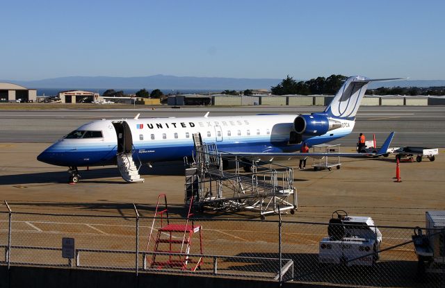 Canadair Regional Jet CRJ-200 (N507CA) - KMRY - N507CA at Monterey CA on a early AM arrival from SFO on 3-31-2011. View looking north.