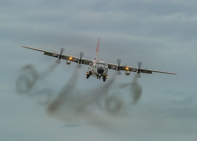 Lockheed C-130 Hercules (C1712) - Smoking the Groove<br>A US Coast Guard HC130R from Kodiak rolls into the groove at Kenai Municipal Airport, Alaska while conducting multiple approaches to the runway. The winds were gusting and swirling inconsistently, as seen by the smoke. ©Bo Ryan Photography | a rel=nofollow href=http://www.facebook.com/BoRyanPhotowww.facebook.com/BoRyanPhoto/a Please vote if you like the image!