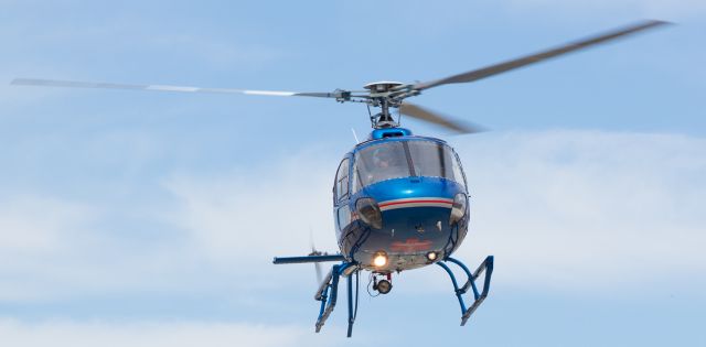 Eurocopter AS-350 AStar (N902CF) - Care Flights N902CF arrives at a training site in Palamino Valley just north of Reno shortly after high noon on Tuesday, June 9 (2015).  Having just completed an emergency run, N902CF was the last of three helicopters to arrive at the training location.  Although I did not yet know as I snapped N902CF landing, I would soon be occupying that empty spot on the right; as a surprise "Thanks from Care Flight to me for doing a photo shoot during the days training session, this helicopter would turn out to be my ride back to downtown Reno when it returned to its standby location at Renown Medical Center.  This first FA gallery photo of N902CF will always be a reminder to me of a fantastic day that ended with a wonderful surprise helicopter ride.  