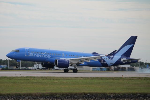Airbus A220-300 (N243BZ) - Breeze Flight 973 arrives on Runway 6 at Southwest Florida International Airport following flight from Portsmouth International Airport