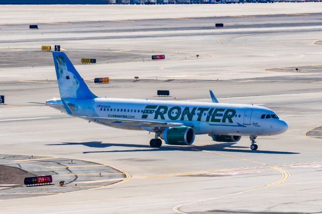 Airbus A320neo (N304FR) - A Frontier Airlines A320 neo "Jack the Rabbit" taxiing at PHX on 2/16/23. Taken with a Canon R7 and Tamron 70-200 G2 lens.