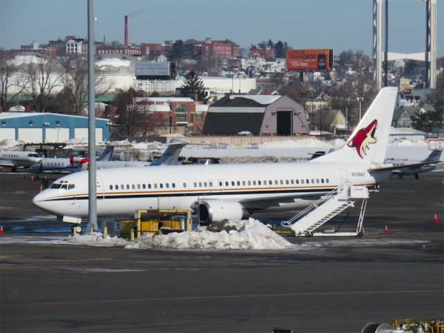 BOEING 737-400 (N129AC) - The 737-400 chartering the Arizona Coyotes to Boston to take on the Bruins. Thats what Alpha Charlie at the end of the registration stands for.