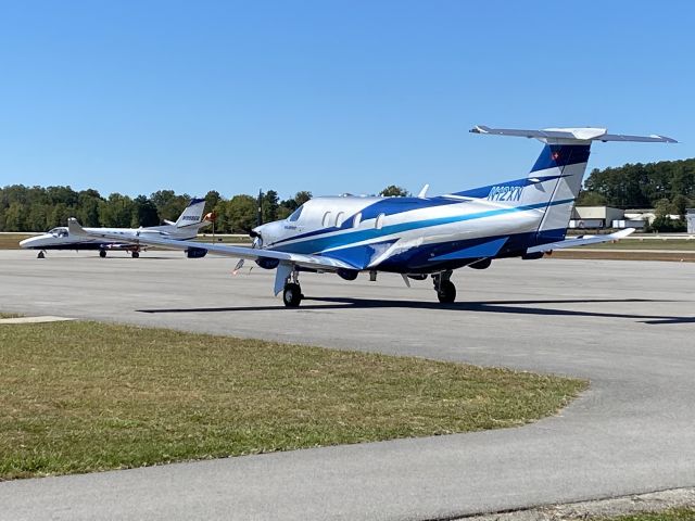 Pilatus PC-12 (N12XN) - Sitting on the ramp with a Cessna Citation V.br /Date Taken: September 30, 2022