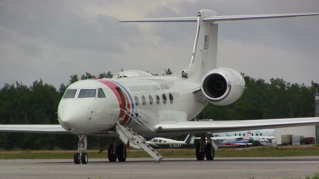 — — - A US Coast Guard Gulfstream C-37A sits on the tarmac at Gander International.