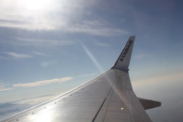 Boeing 737-800 (EI-DWH) - In flight near the southern Alps.