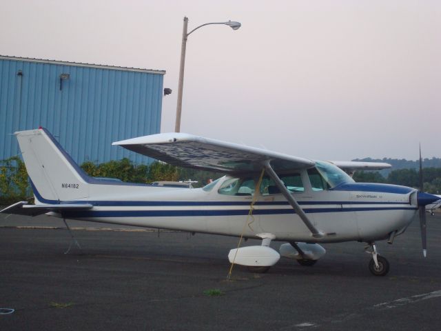 Cessna Skyhawk (N64182) - N64182 tied down and parked at dusk at 4B8.