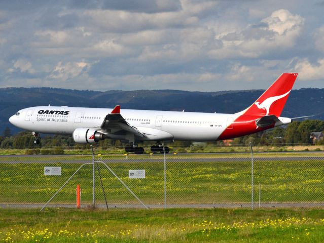 Airbus A330-300 (VH-QPJ) - Putting down on runway 05. Thursday 12th July 2012.