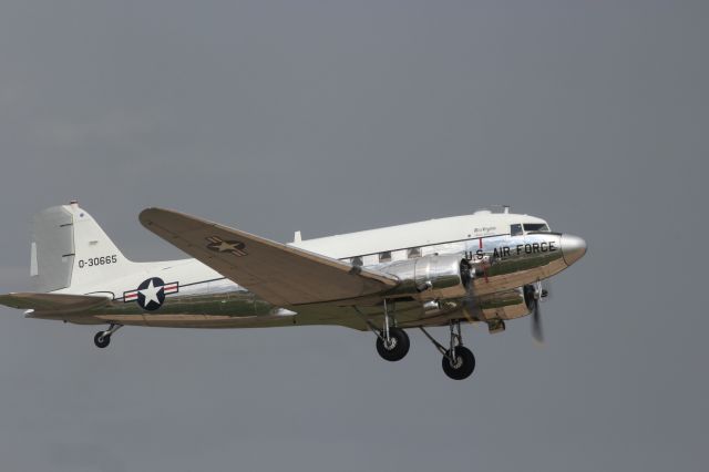 Douglas DC-3 (N47E) - One of my favorite C-47s takes to the skies.  Miss Virginia against a dark sky background.  