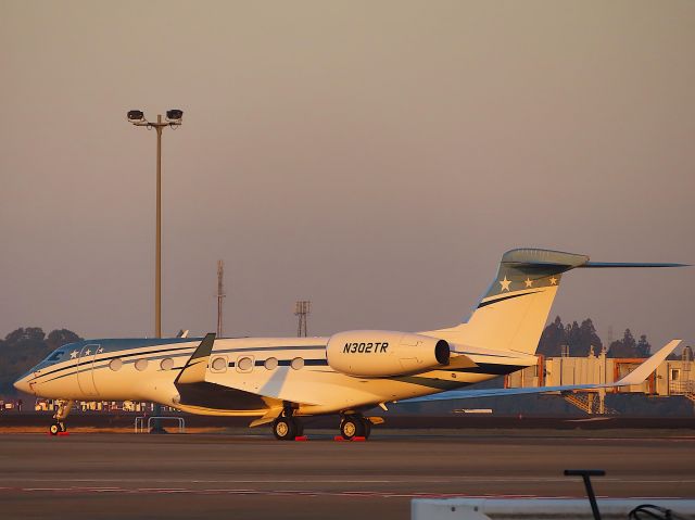 Gulfstream Aerospace Gulfstream G650 (N302TR) - Photo taken on Dec 24, 2021.br /The N302TR is in stay, shining golden in the morning sun.