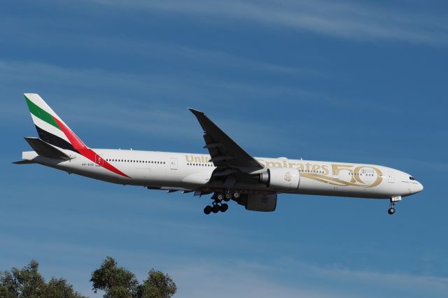 BOEING 777-300 (A6-EGE) - Boeing 777-31H_ER cn 35597 Ln 957. Emirates A6-EGE 50th year titles rwy 21 YPPH 03 January 2022