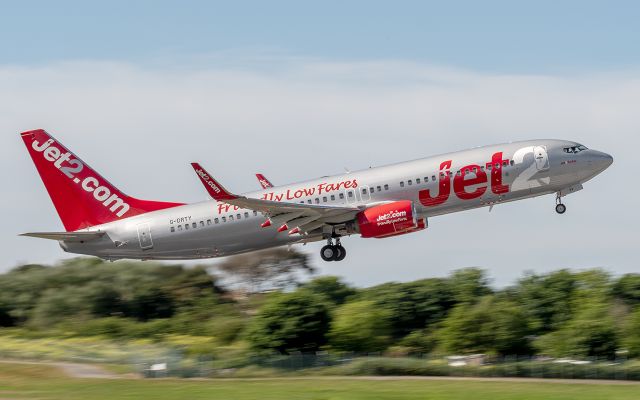 Boeing 737-800 (G-DRTY) - Slow shutter capture of a Jet2 Boeing 737-8ASWL departing Jersey on 21/May/2022