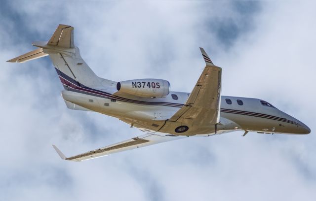 Embraer Phenom 300 (N374QS) - N374QS is a 2015 Embraer Phenom 300, seen here departing Augusta Georgia's regional airport shortly after the conclusion of the 2023 Masters golf tournament. I shot this with a Canon 5Dsr and a Canon 500mm IS lens and a 1.4 extender on it, making the focal length 700mm. Camera settings were 1/8000 shutter, F5.6, ISO 1000. Please check out my other photography. Positive votes and comments are always appreciated. Questions about this photo can be sent to Info@FlewShots.com