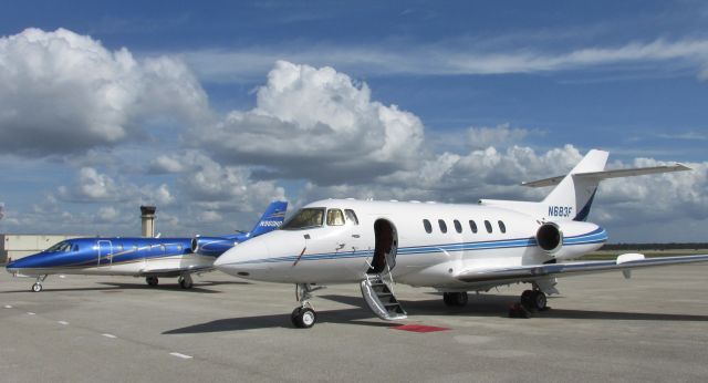 Hawker 800 — -  Hawker 800A on the ramp at Fort Meyers Southwest Regional, next to this nice looking Citation Excel