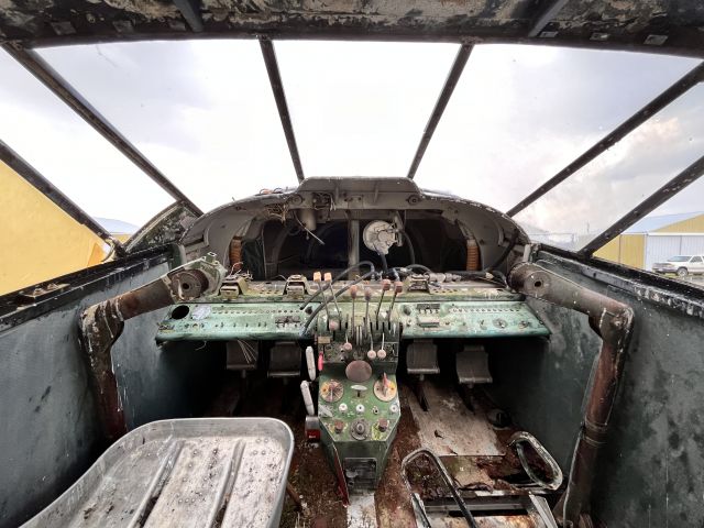 Beechcraft 18 (C-FDWS) - The cockpit of an old Canadian Beech C-45 Expeditor. Used to be on floats, now rots in a field on wheels. 