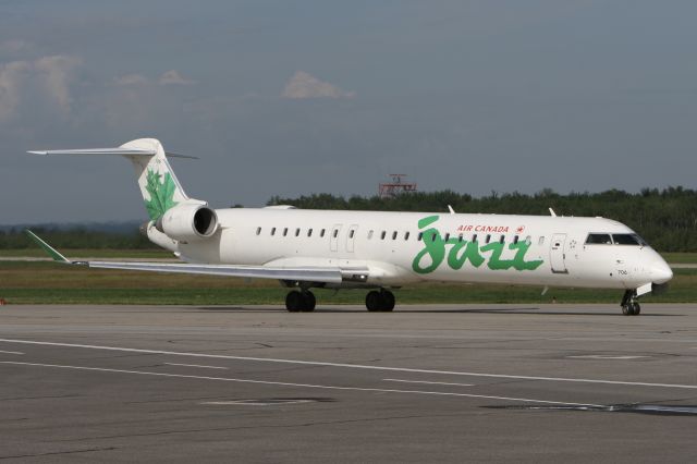 Canadair Regional Jet CRJ-900 (C-FKJZ) - July 11, 2010 - leaving terminal at Quebec City