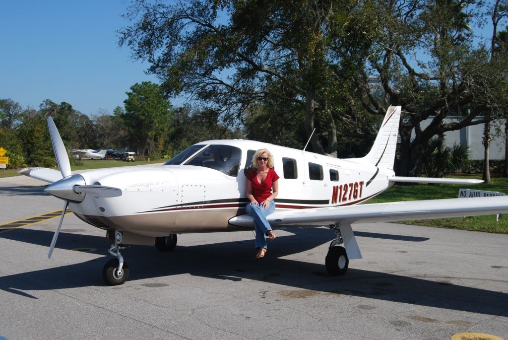 Piper Saratoga (N127GT) - The Air Boss poses with our Saratoga at Spruce Creek.