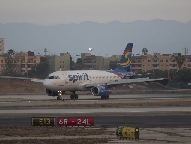 Airbus A319 (N502NK) - This A319 has just landed and is turning off 24R, LAX Los Angeles, California USA