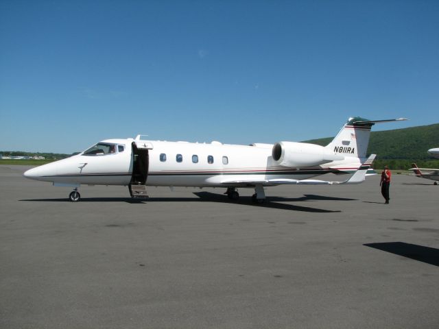 Learjet 60 (N811RA) - Learjet 60, parked next to us.