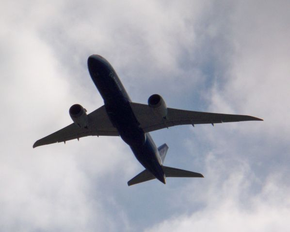 Boeing 787-8 (N787BX) - The 787 shows off its raked wingtips as it departs during the Dream Tour, 3/13/2012.