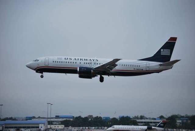 BOEING 737-400 (N457UW) - Arriving on runway 18L - 10/23/09