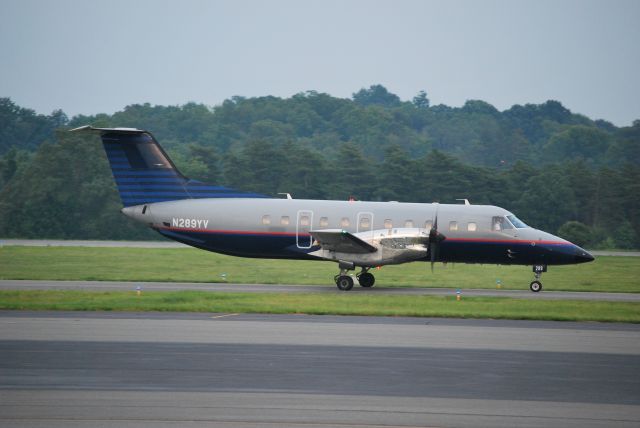 Embraer EMB-120 Brasilia (N289YV) - Taxiing in after landing on runway 02 at KJQF still in United Express livery - 6/15/09