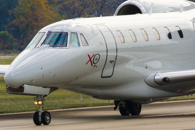 Cessna Citation X (N780XJ) - N780XJ is a 2007 Cessna Citation X (750) seen here taxiing to the ramp shortly after landing at Atlanta's PDK executive airport. I shot this with a Canon 500mm lens. Camera settings were 1/250 shutter, F18, ISO 320.  Please check out my other photography. Votes and positive comments are always appreciated. Questions about this photo can be sent to Info@FlewShots.com