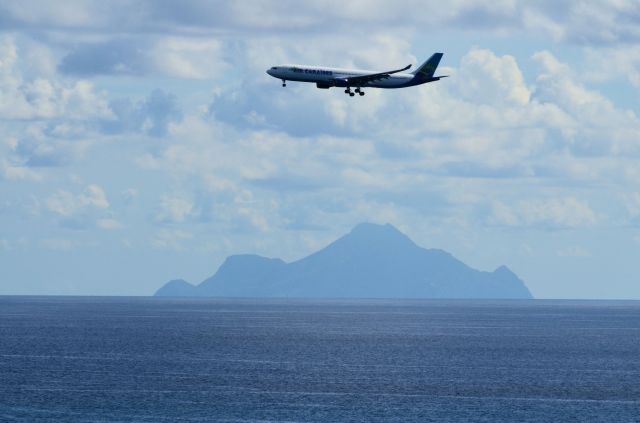 F-HPTP — - Air Caraibes coming in for landing with Saba in the background.