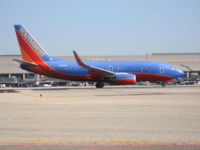 Boeing 737-700 (N463WN) - Holding on RWY 19R